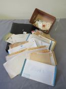 A COLLECTION OF BRITISH AND WORLD STAMPS, loose and in an album, includes a nice selection of