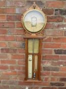 A LATE 19TH CENTURY ROYAL POLYTECHNIC WALL BAROMETER, the oak case with large circular barometer