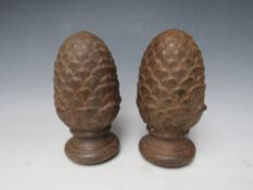A PAIR OF CAST PINEAPPLE FINIALS, H 20 cm (2)