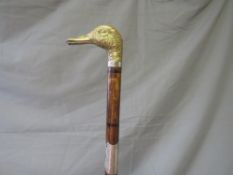 A LATE 19TH / EARLY 20TH CENTURY WALKING STICK, with white metal banding and white metal handle in