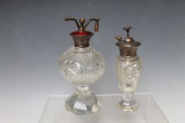 A SILVER AND GUILLOCHE ENAMEL TOPPED CUT GLASS ATOMIZER, in rich ruby red enamel, stamped '