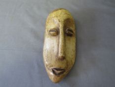 AFRICAN TRIBAL ART CONGO LEGA CARVED BONE PASSPORT MASK