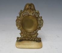 A 19TH CENTURY ORMOLU POCKET WATCH HOLDER ON STAND, H 12 cm