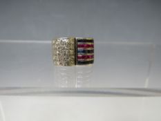AN UNUSUAL TWO COLOUR SAPPHIRE AND DIAMOND 'OPEN BOOK' DESIGN RING, having pave style set