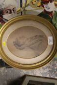 A 19TH CENTURY OVAL PENCIL DRAWING OF A LADY INITIALLED A.S.