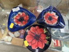 A PAIR OF MOORCROFT ASHTRAYS TOGETHER WITH A PIN DISH