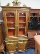 A VICTORIAN WALNUT AND GILT GLAZED BOOKCASE H 228 W 103 CM