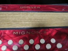 A SMALL HOHNER ACCORDION TOGETHER WITH A TYPEWRITER ETC