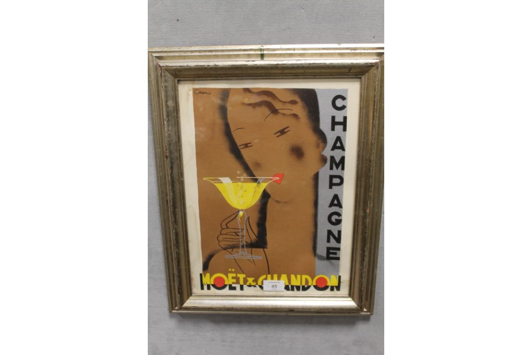 A MOET AND CHANDON FRAMED ADVERTISING POSTER