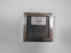 A HALLMARKED SILVER SMALL SQUARE PHOTO FRAME