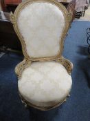 AN ANTIQUE GILT SALON CHAIR A/F