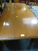 A REPRODUCTION MAHOGANY COFFEE TABLE