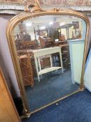 AN ANTIQUE GILT OVERMANTLE MIRROR 126 X 137 CM