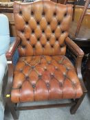 A 20TH CENTURY LEATHER ARMCHAIR