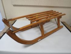 A VINTAGE DAVOS WOODEN SLEDGE