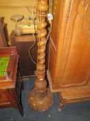 A LARGE AND IMPRESSIVE CARVED BARLEYTWIST TORCHERE / LAMP