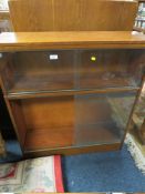 A VINTAGE OAK GLAZED BOOKCASE