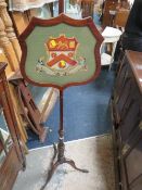 A MAHOGANY POLE SCREEN