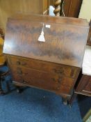 A VINTAGE MAHOGANY BUREAU
