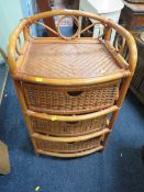A WICKER THREE DRAWER UNIT