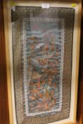 A FRAMED ORIENTAL DECORATIVE SILK PANEL