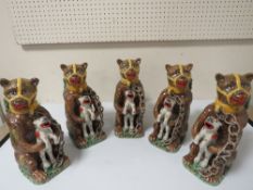 FIVE REPRODUCTION BEAR GREASE TEAPOTS
