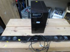 A SAMSUNG SOUND BAR AND A SUBWOOFER
