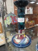 A VINTAGE MOORCROFT CANDLESTICK