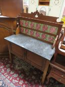 AN EDWARDIAN MARBLE TOPPED TILE BACK WASHSTAND