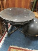 AN EDWARDIAN CARVED OCCASIONAL TABLE S/D