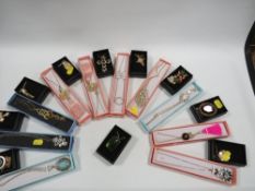 A COLLECTION OF NEW BOXED COSTUME JEWELLERY PENDANTS AND NECKLACES