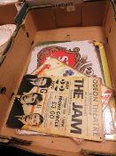 A BOX OF METAL ADVERTISING SIGNS