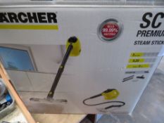 A BOXED KARCHER SE1 STEAM STICK WITH ATTACHMENTS & INSTRUCTIONS