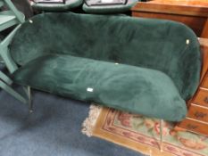 A MODERN GREEN UPHOLSTERED SOFA - W 140 CM
