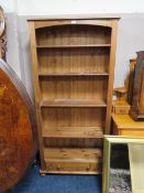 A MODERN OPEN HONEY PINE FLOOR STANDING BOOKCASE