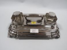 A SILVER PLATED DESK TIDY WITH GLASS INKWELLS