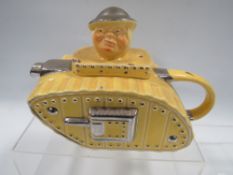 A SADLER STYLE NOVELTY TEA-POT IN THE FORM OF A MAN IN A TANK