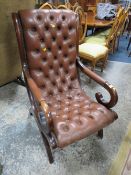 A REPRODUCTION MAHOGANY ARMCHAIR A/F