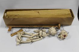 A VINTAGE PELHAM PUPPET IN THE FORM OF A SKELETON IN ORIGINAL BOX A/F