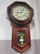 A MAHOGANY CASED 31 DAY REGUALTOR CLOCK