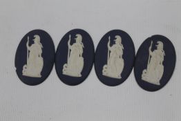 FOUR VINTAGE WEDGWOOD CAMEO PLAQUES