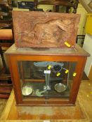 A CASED SET OF CHEMISTS SCALES WITH AN UNUSUAL CARVED FIGURATIVE BLOCK (2)