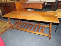 AN OAK CARVED COFFEE TABLE