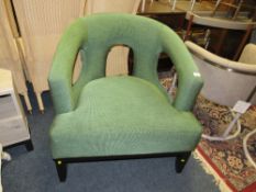 A MODERN GREEN OVER-SIZED OPEN ARMCHAIR