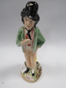 A STAFFORDSHIRE STYLE DOUBLE SIDED GIN / WATER FIGURE A/F