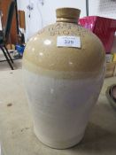 AN ADVERTISING STONEWARE FLAGON FOR W H & J JOULE STONE
