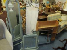 A HONEY PINE OPEN BOOKCASE WITH A GREEN CHEVAL MIRROR, SMALLER MIRROR, ANOTHER MIRROR AND MODERN