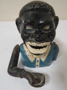 A HAPPY JOE MONEY BANK WITH BLUE JACKET AND EYES