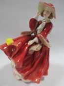 A ROYAL DOULTON FIGURINE 