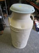 AN OVER PAINTED EXPRESS DAIRY MILK CHURN